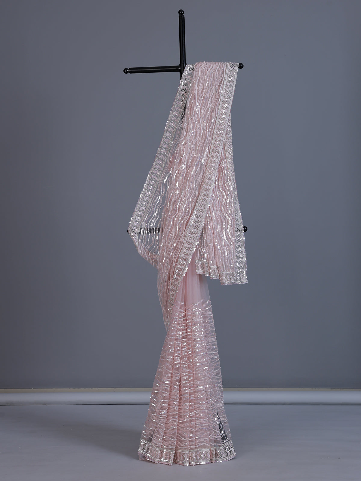 Baby pink party wear net saree with beads and cutdana work