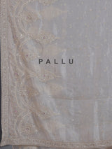 Beige tissue silk reception wear saree with cutdana work