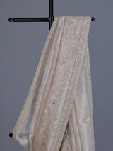 Beige tissue silk reception wear saree with cutdana work