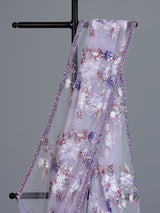 Purple reception wear net saree with heavy detailing