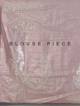 Peach tissue silk saree for wedding celebration
