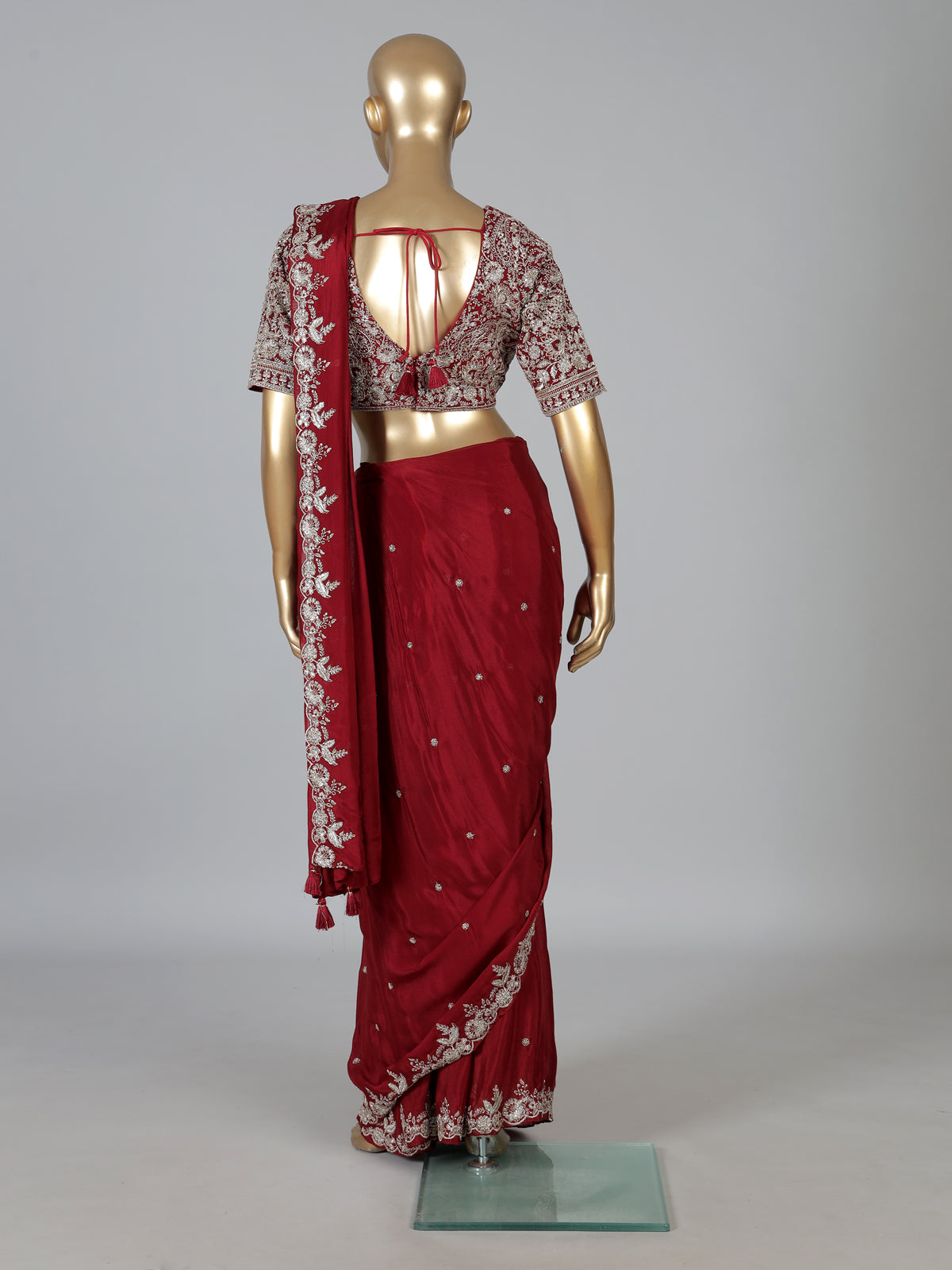 Maroon tissue silk designer saree with elegant embellishments