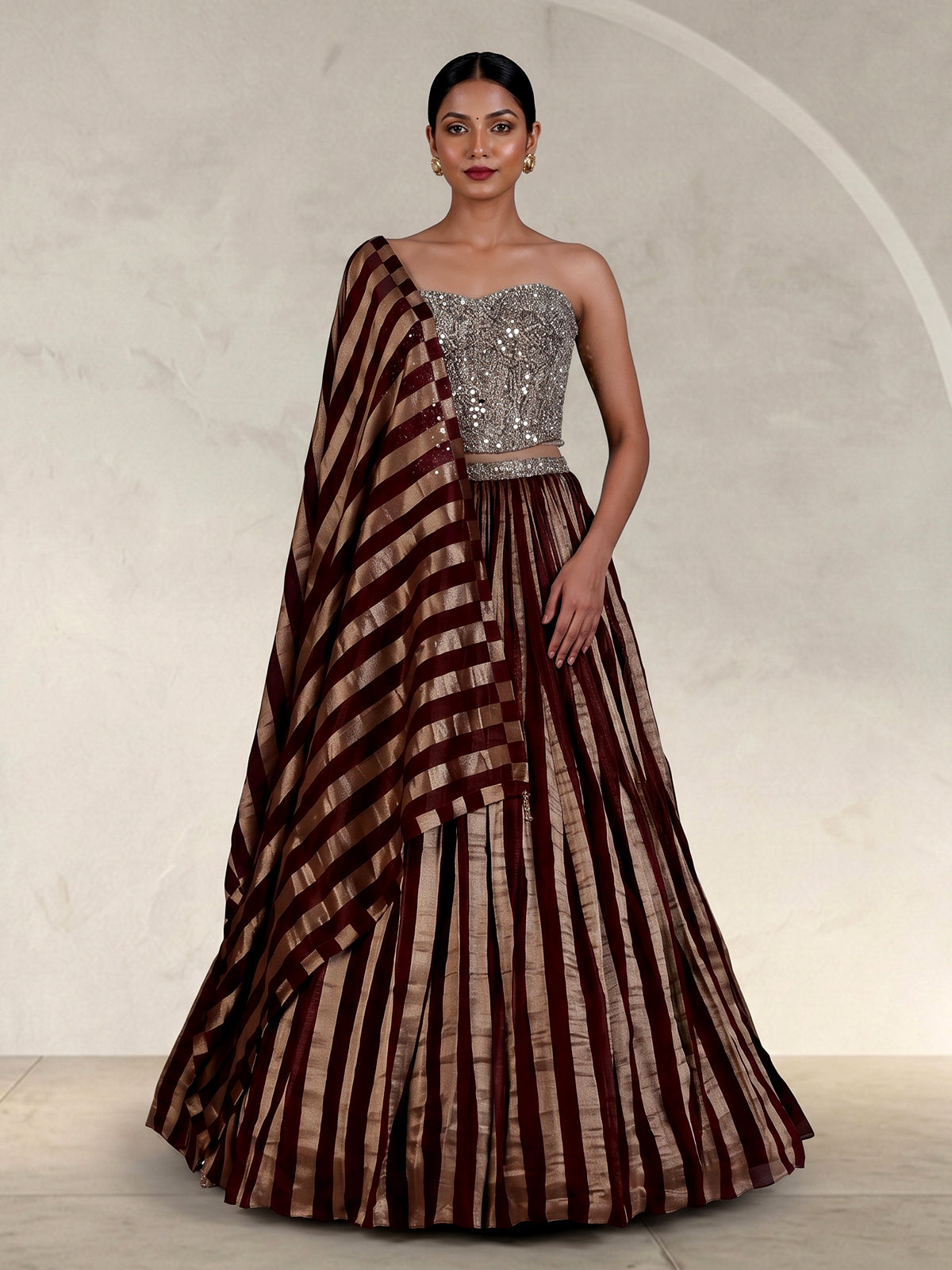 Brown georgette embellished lehenga choli with elegant dupatta