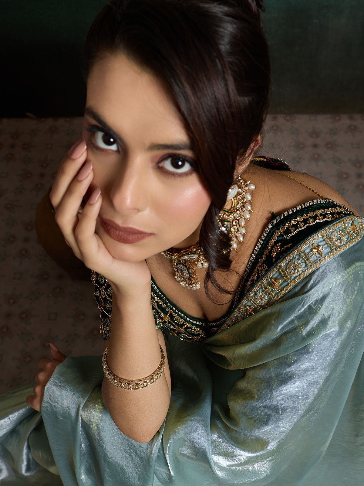 Sage green satin saree with cutdana worked blouse