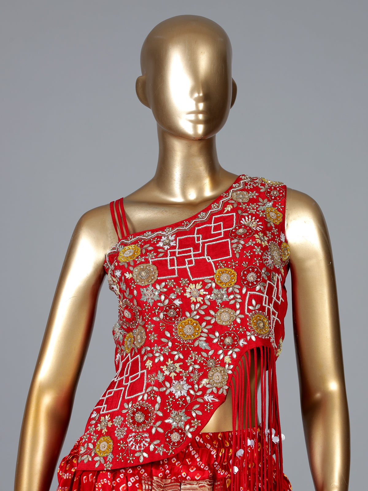 Red bandhej printed silk dhoti suit with embellishments
