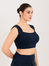 Blue cotton lycra curved sweetheart neck sleeveless blouse