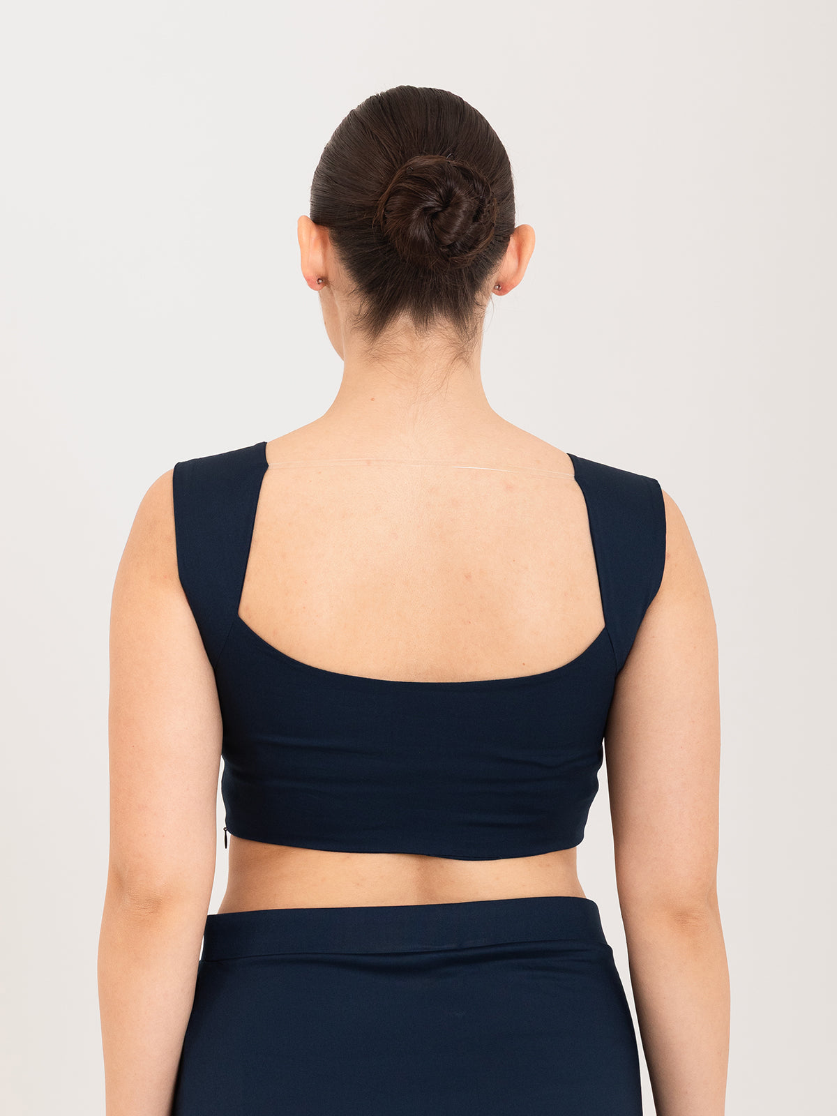 Blue cotton lycra curved sweetheart neck sleeveless blouse