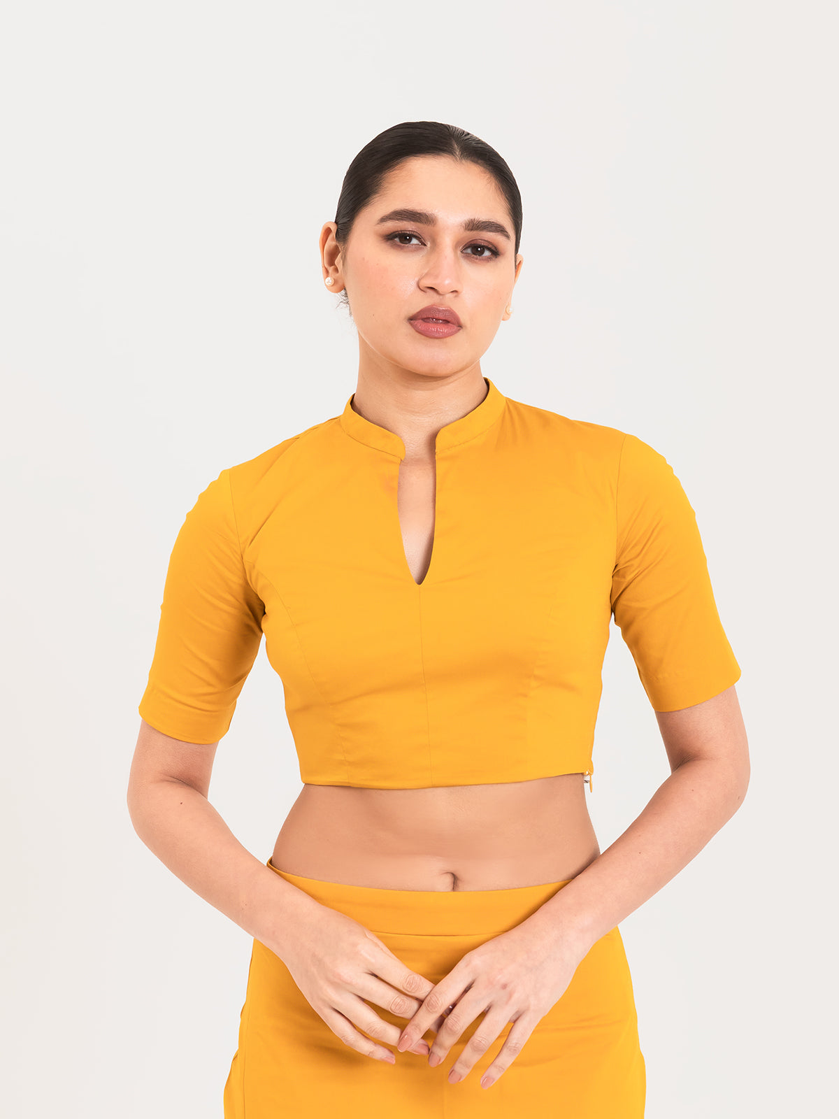 Yellow cotton lycra collar neck half sleeves blouse