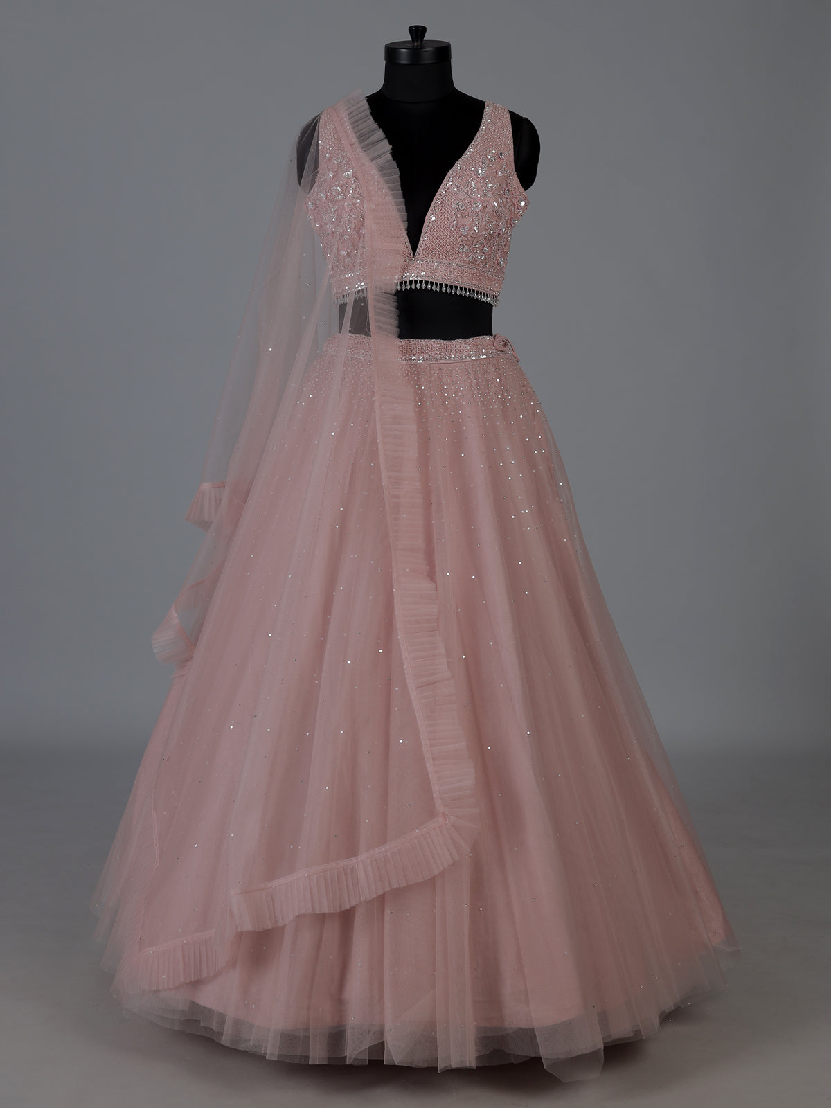 Pink designer net embellished lehenga choli