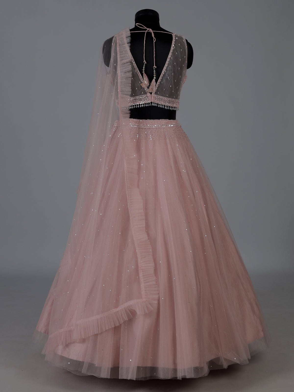 Pink designer net embellished lehenga choli