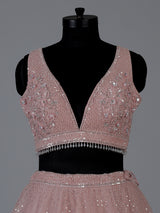 Pink designer net embellished lehenga choli