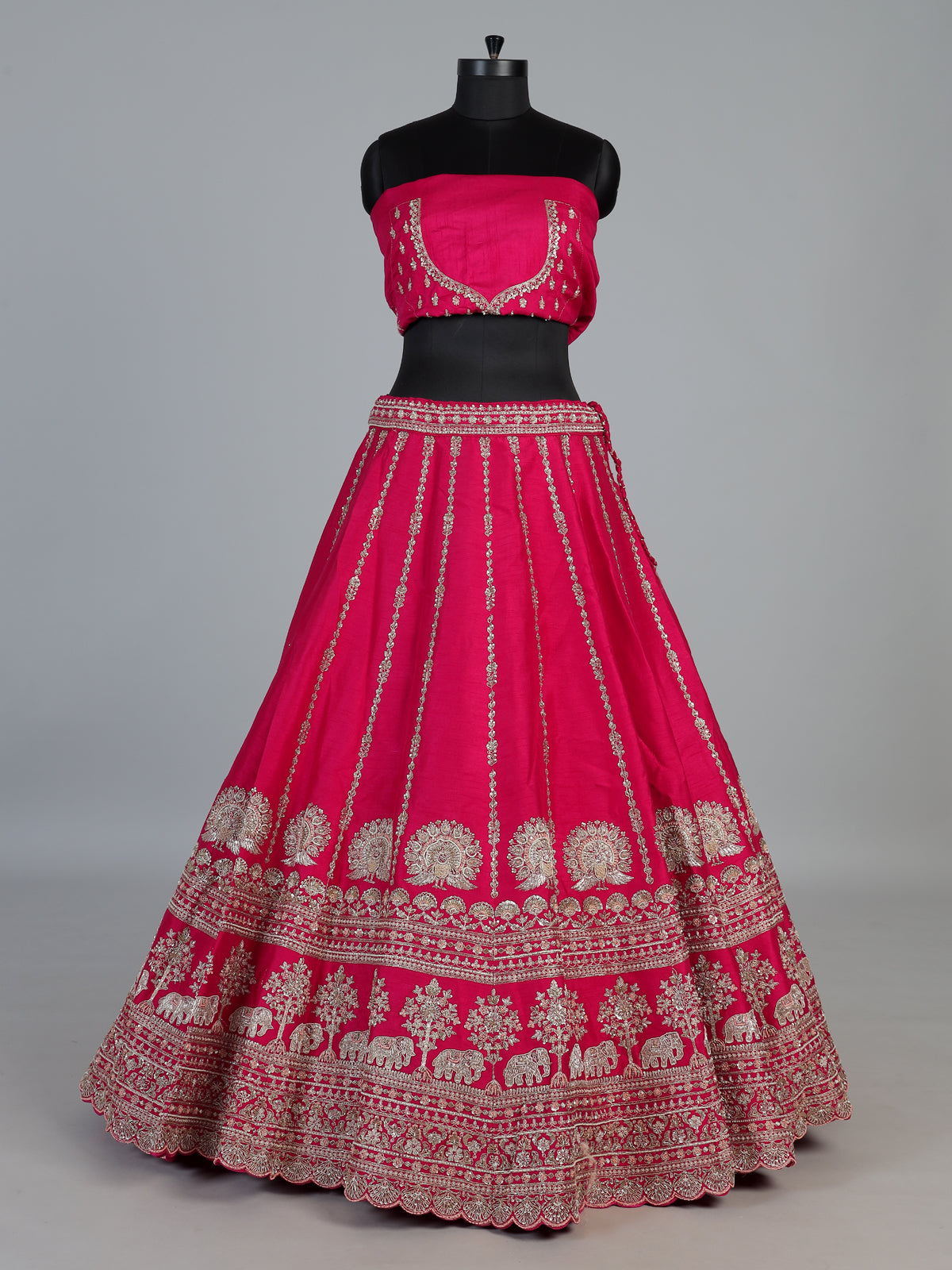 Rani pink bridal raw silk lehenga choli with embellished dupatta
