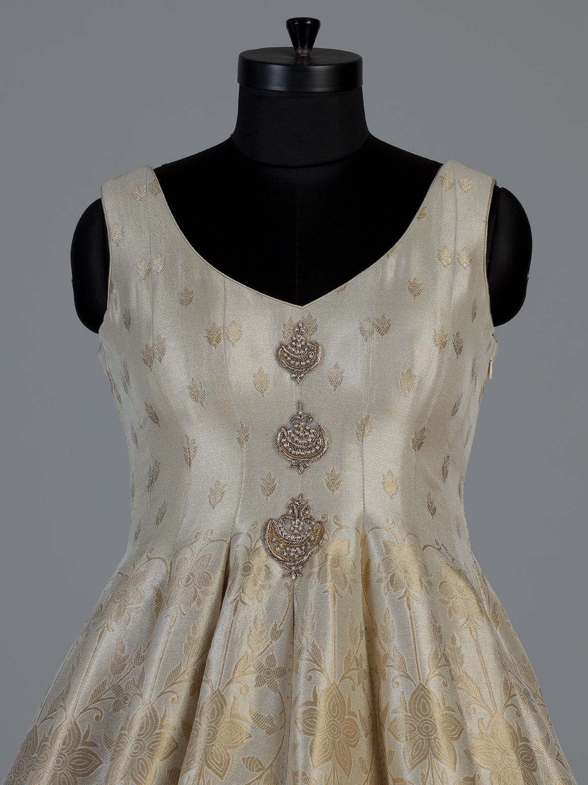 Ivory silk sleeveless anarkali salwar suit with elegant dupatta