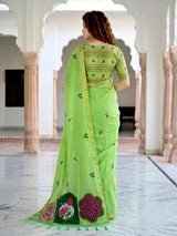 Green floral printed cotton blend saree with elegant patch work