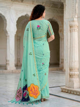 Mint blue printed cotton saree with handcrafted patch design