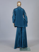 Blue designer silk sharara suit with contemporary asymmetrical style