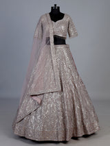Onion pink embellished net designer lehenga choli