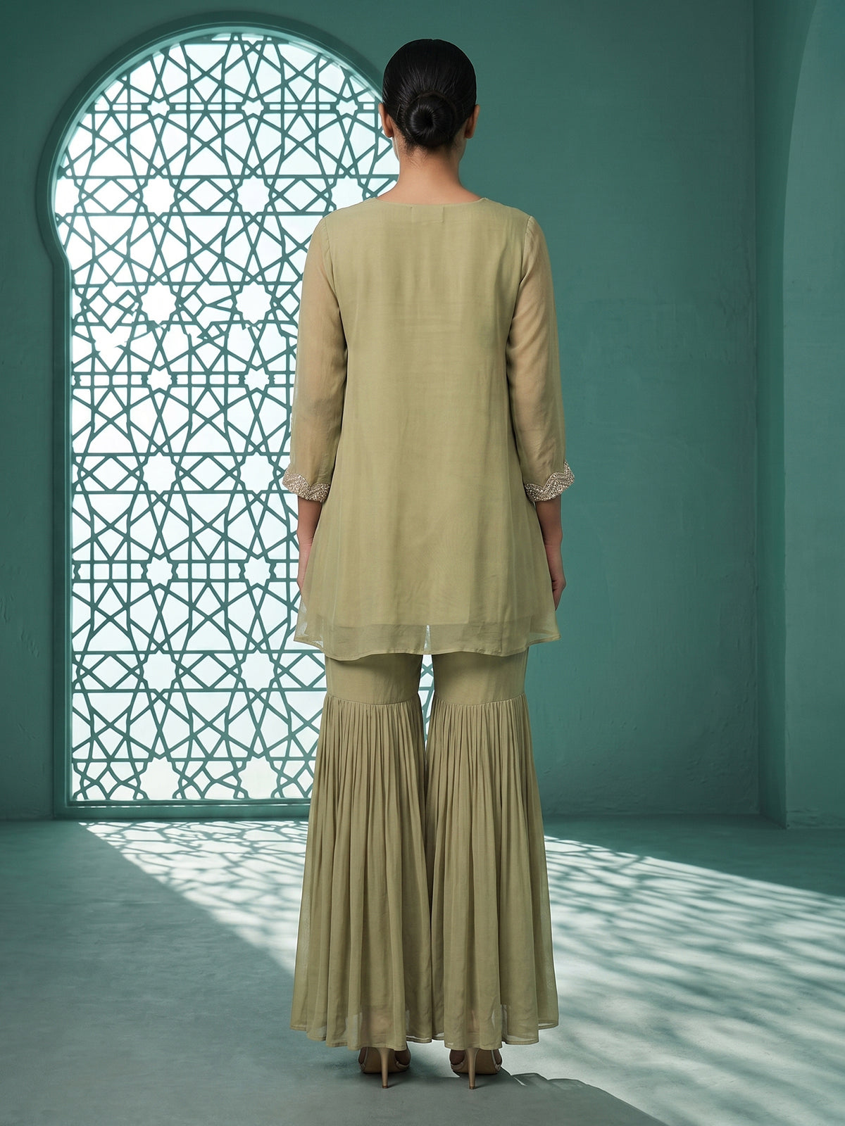 Sea green georgette silk pleated sharara suit ensemble