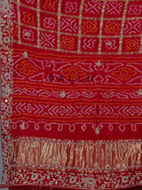 Red traditional bandhani silk bridal saree with elegance