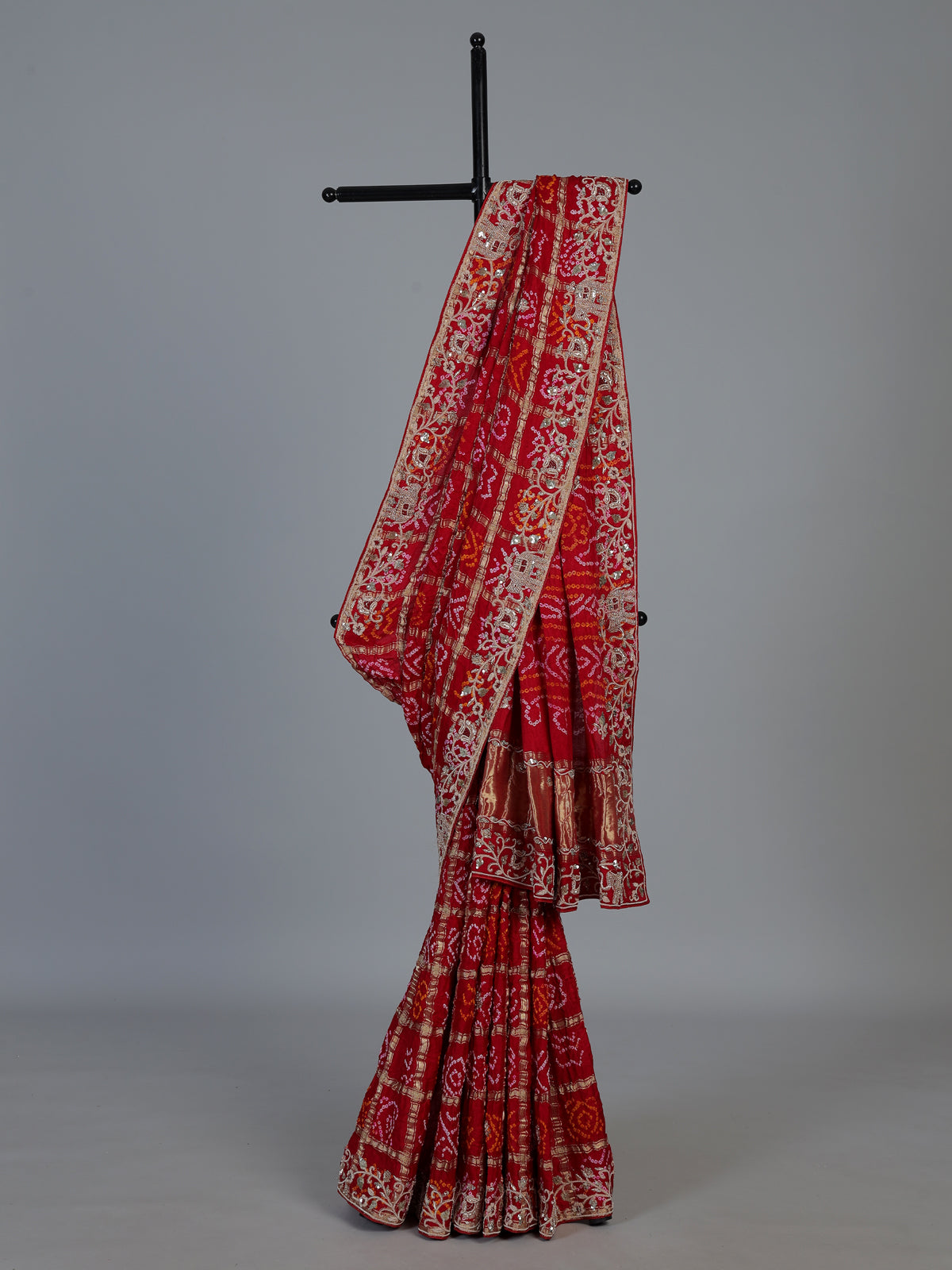 Red traditional bandhani silk bridal saree with elegance