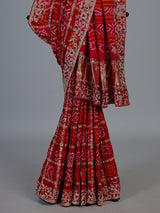 Red traditional bandhani silk bridal saree with elegance