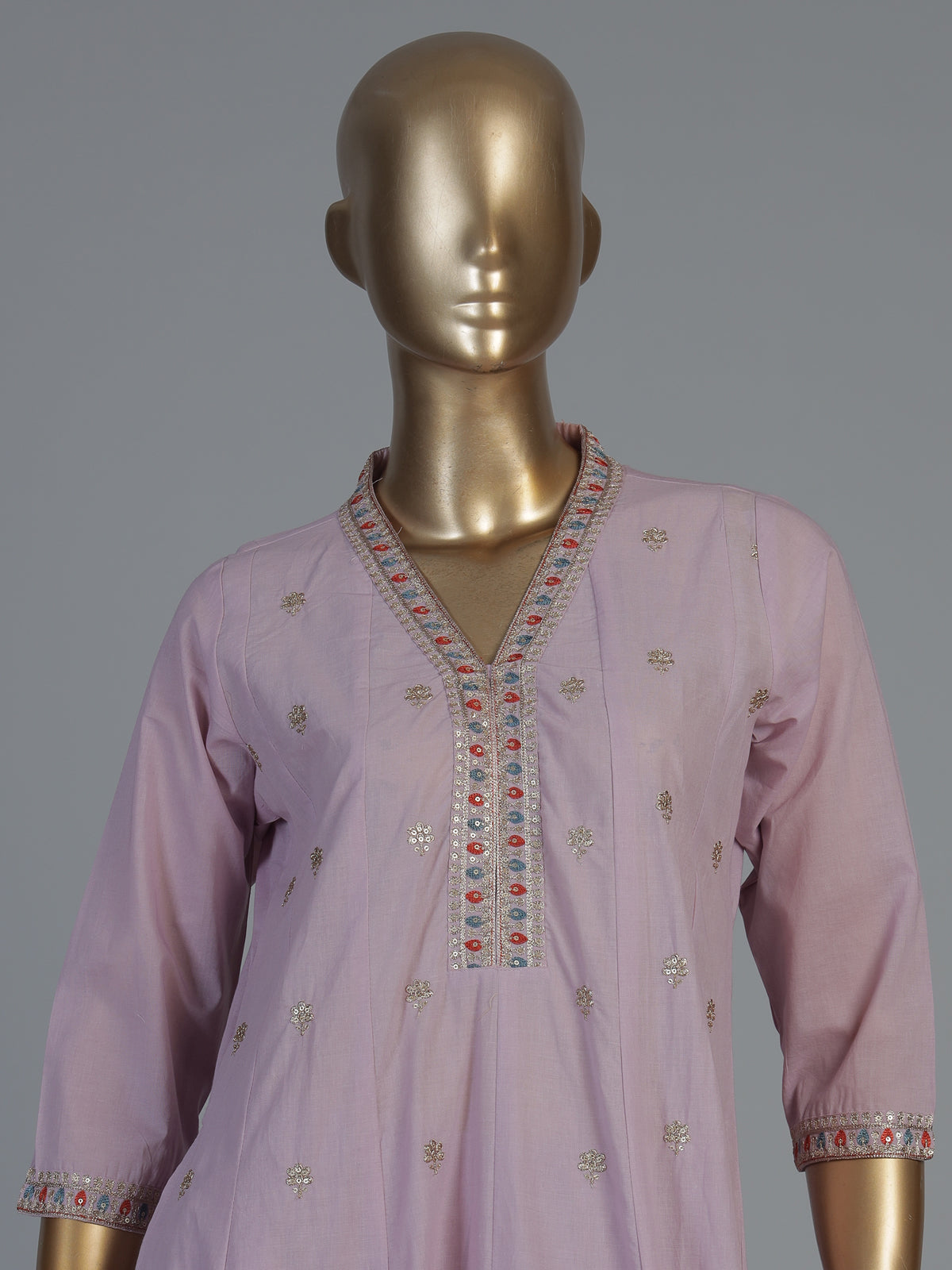 Light purple kurti set with refined festive craftsmanship