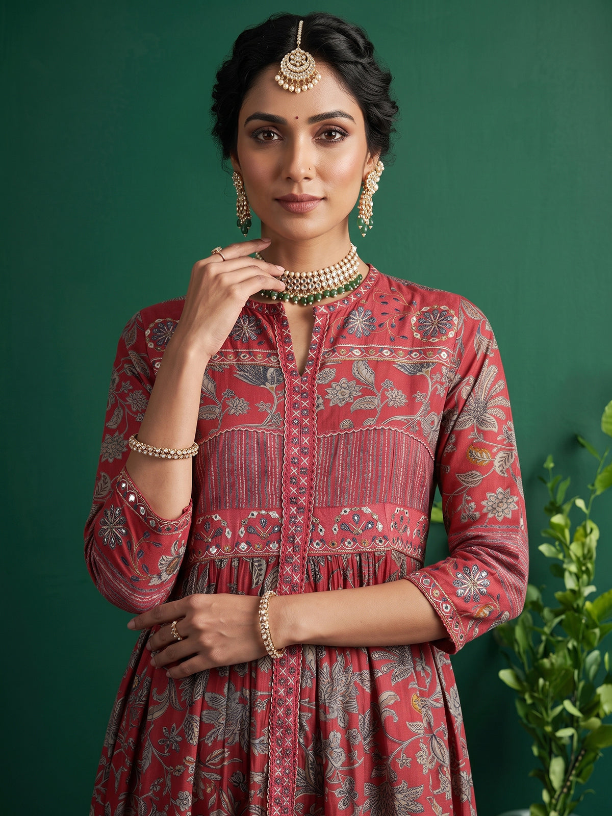Red printed kurti set with kalamkari inspired charm