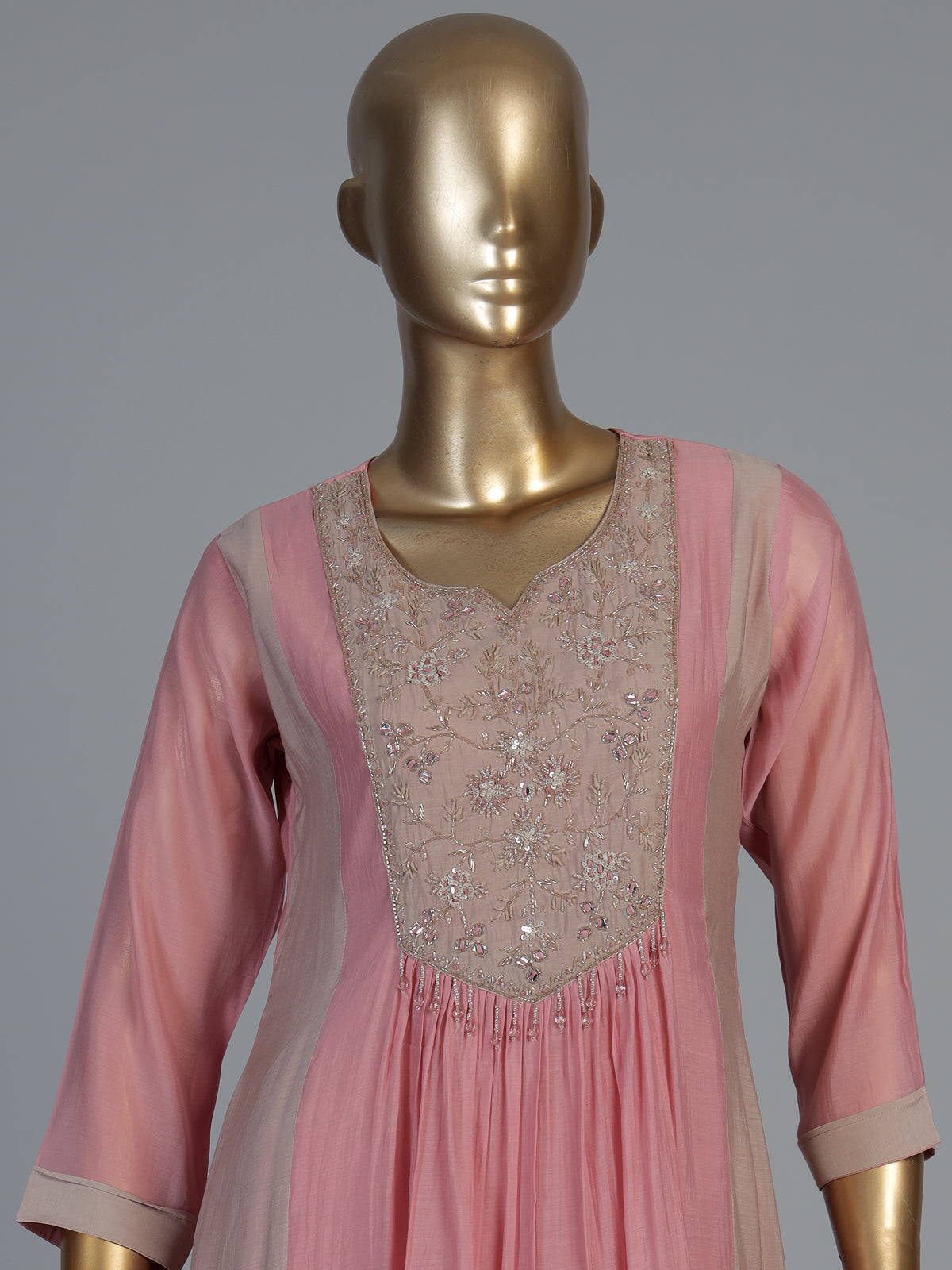Pink crepe silk kurti set with luxurious festive sparkle