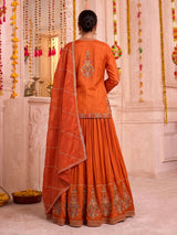 Rust orange raw silk lehenga choli with festive dupatta style