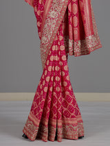 Rani pink georgette designer saree with festive elegance