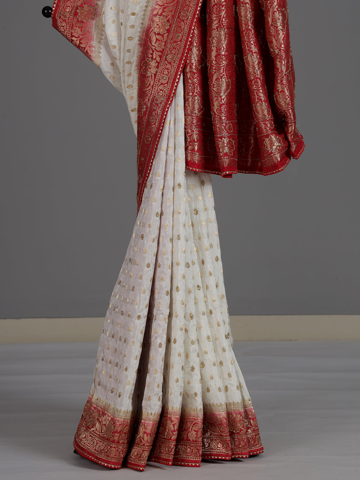 White dola silk elegant festive saree with luxurious embellishments