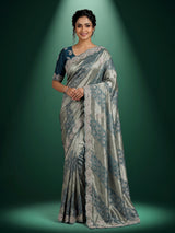 Teal blue tissue silk designer saree with elegant festive work