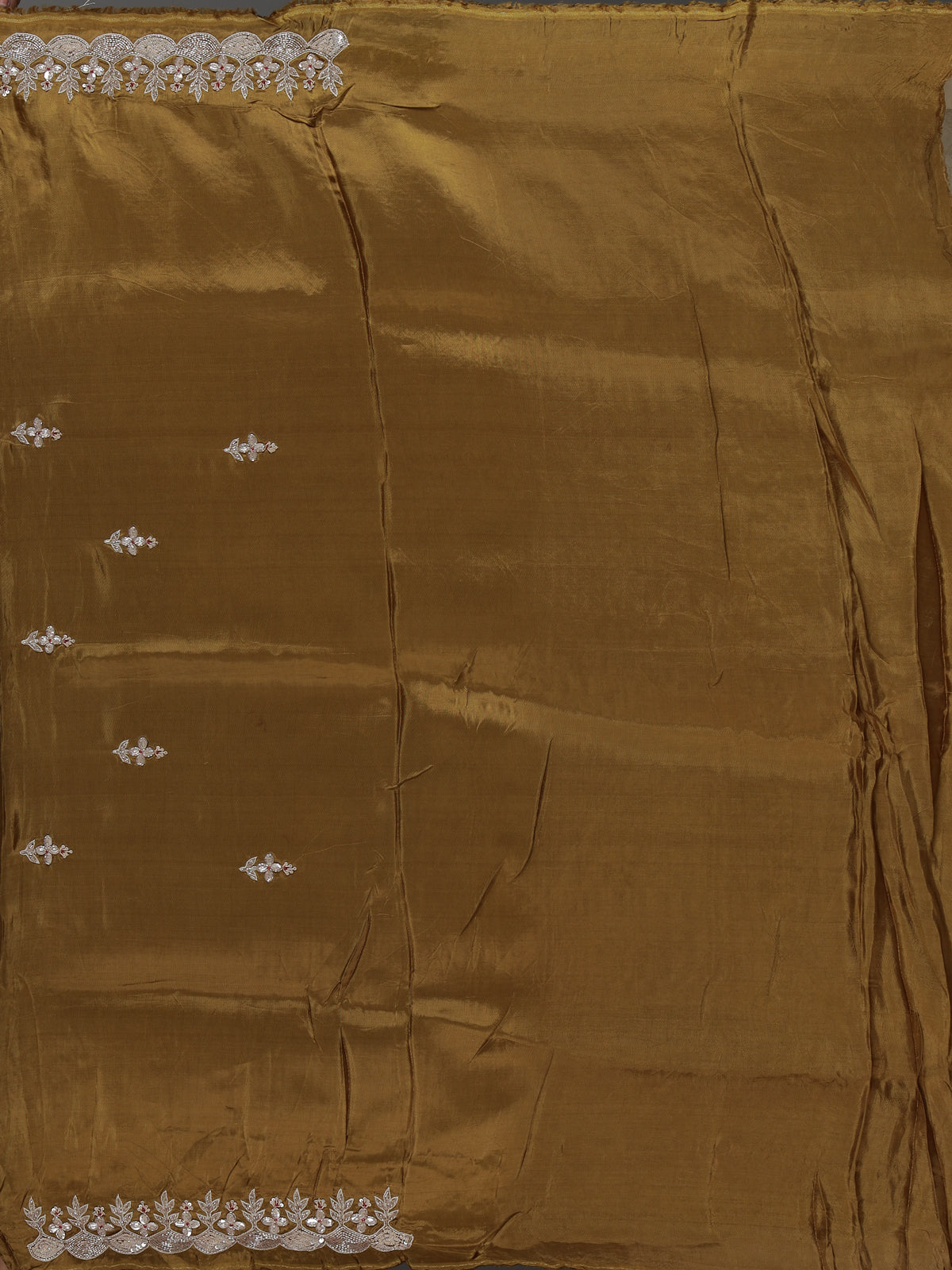 Off white tissue dola silk saree with timeless festive elegance