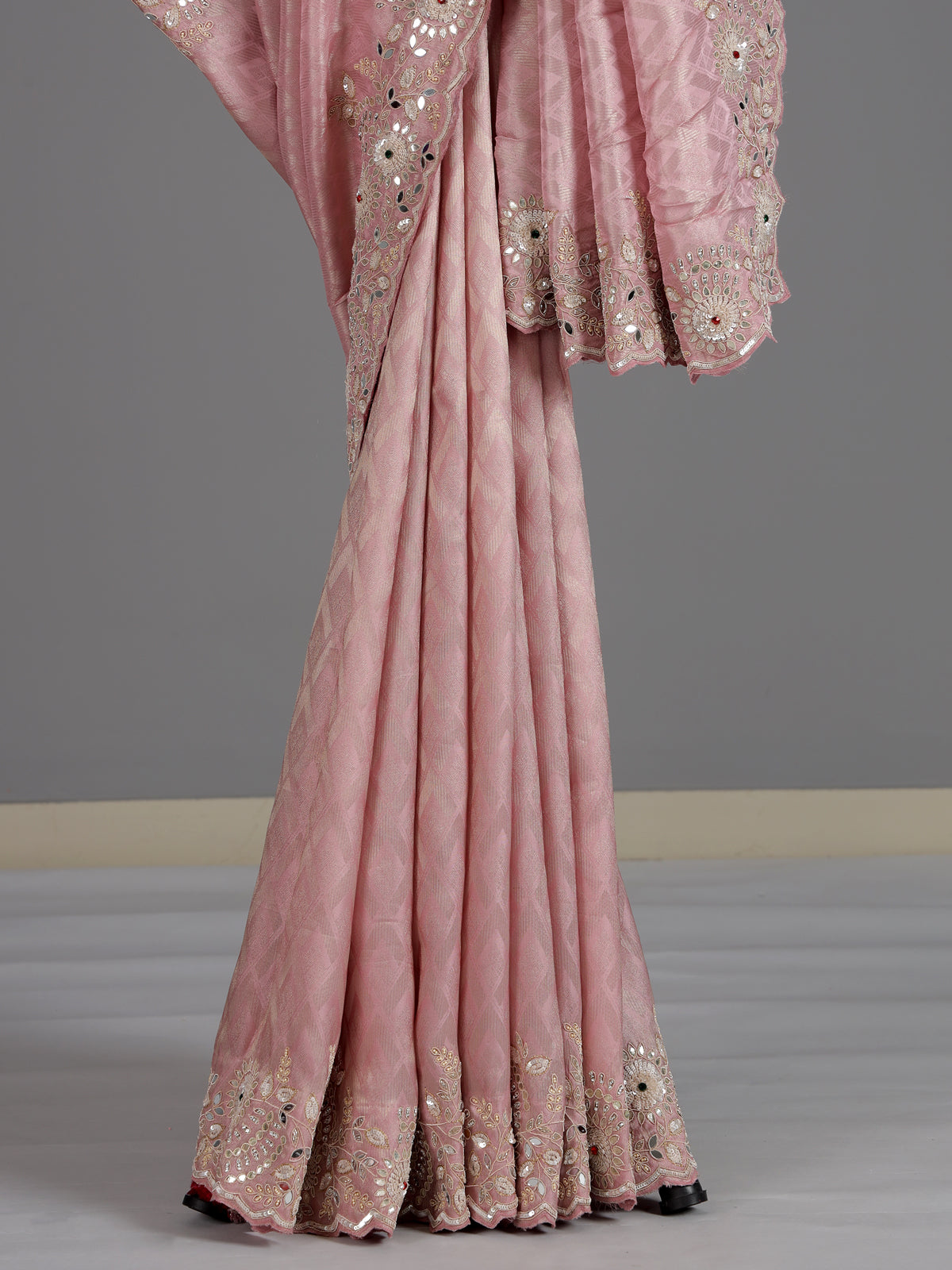 Light pink ziraf silk designer saree with luxurious embellishment work
