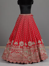 Red raw silk unstitched bridal lehenga choli with peacock motif