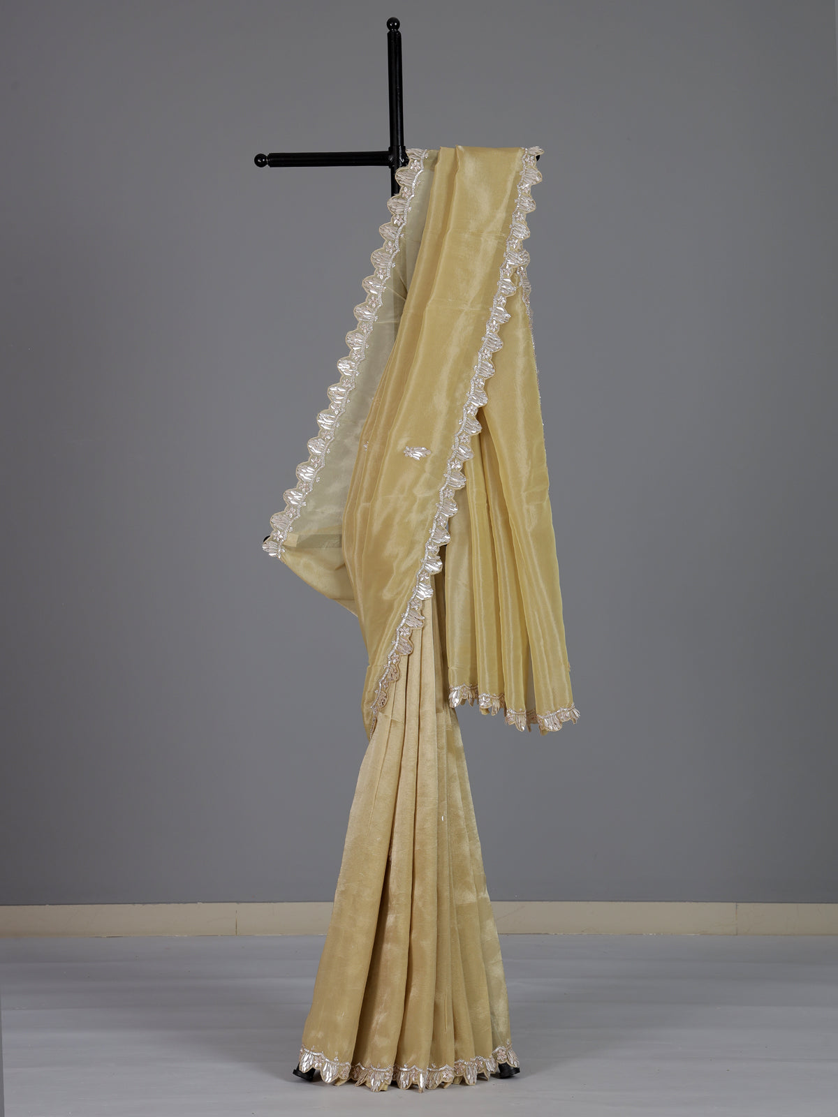 Classic cream tissue silk saree for party and reception wear