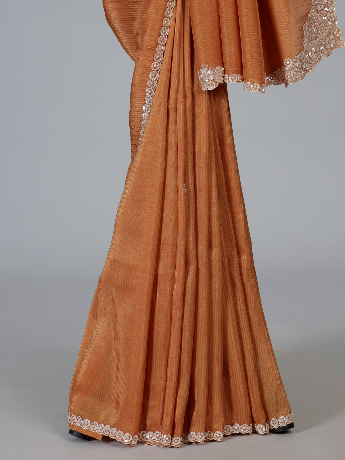 Rust orange shimmer dola silk saree for festive celebrations