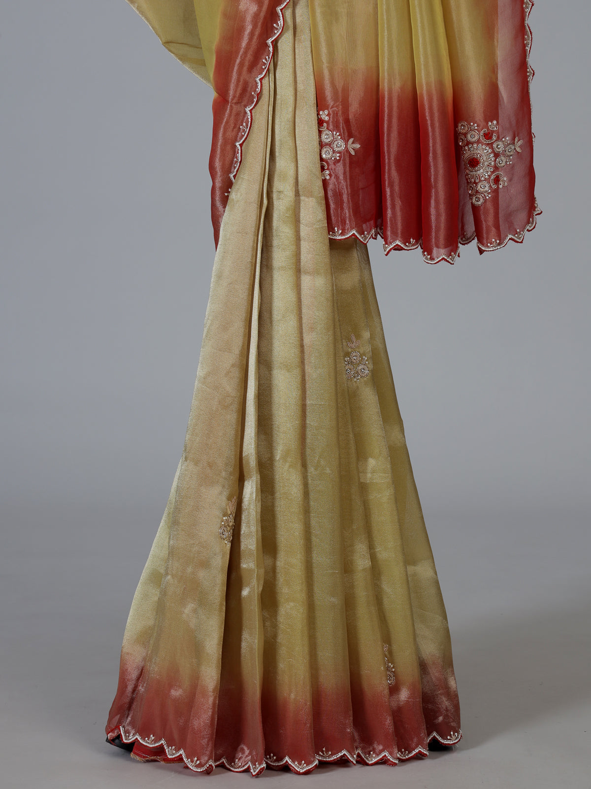 Yellow shaded tissue silk festive saree with graceful handcrafted elegance