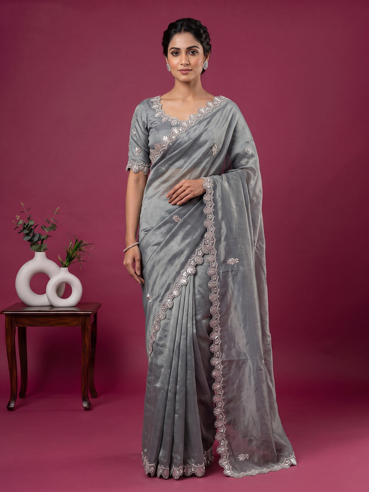 Pastel grey designer tissue silk saree with luxurious festive craftsmanship