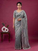 Pastel grey designer tissue silk saree with luxurious festive craftsmanship