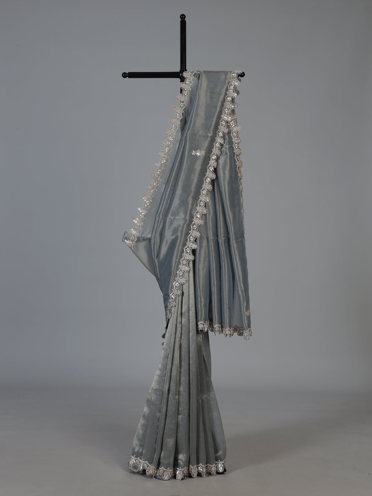 Pastel grey designer tissue silk saree with luxurious festive craftsmanship