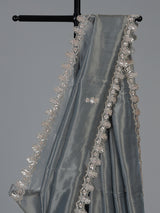Pastel grey designer tissue silk saree with luxurious festive craftsmanship