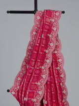 Rani pink bandhani dola silk saree with luxurious festive elegance