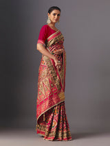Rani pink art patola silk saree with elegant animal and bird motifs
