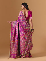 Rani pink art silk saree with graceful patola motif detailing
