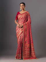 Red art silk patola saree with traditional animal and bird artistry