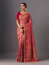 Red art silk patola saree with traditional animal and bird artistry