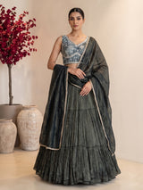 Bottle green tiered crepe silk designer lehenga creation
