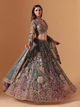 Teal green net designer lehenga choli with elegant dupatta grace