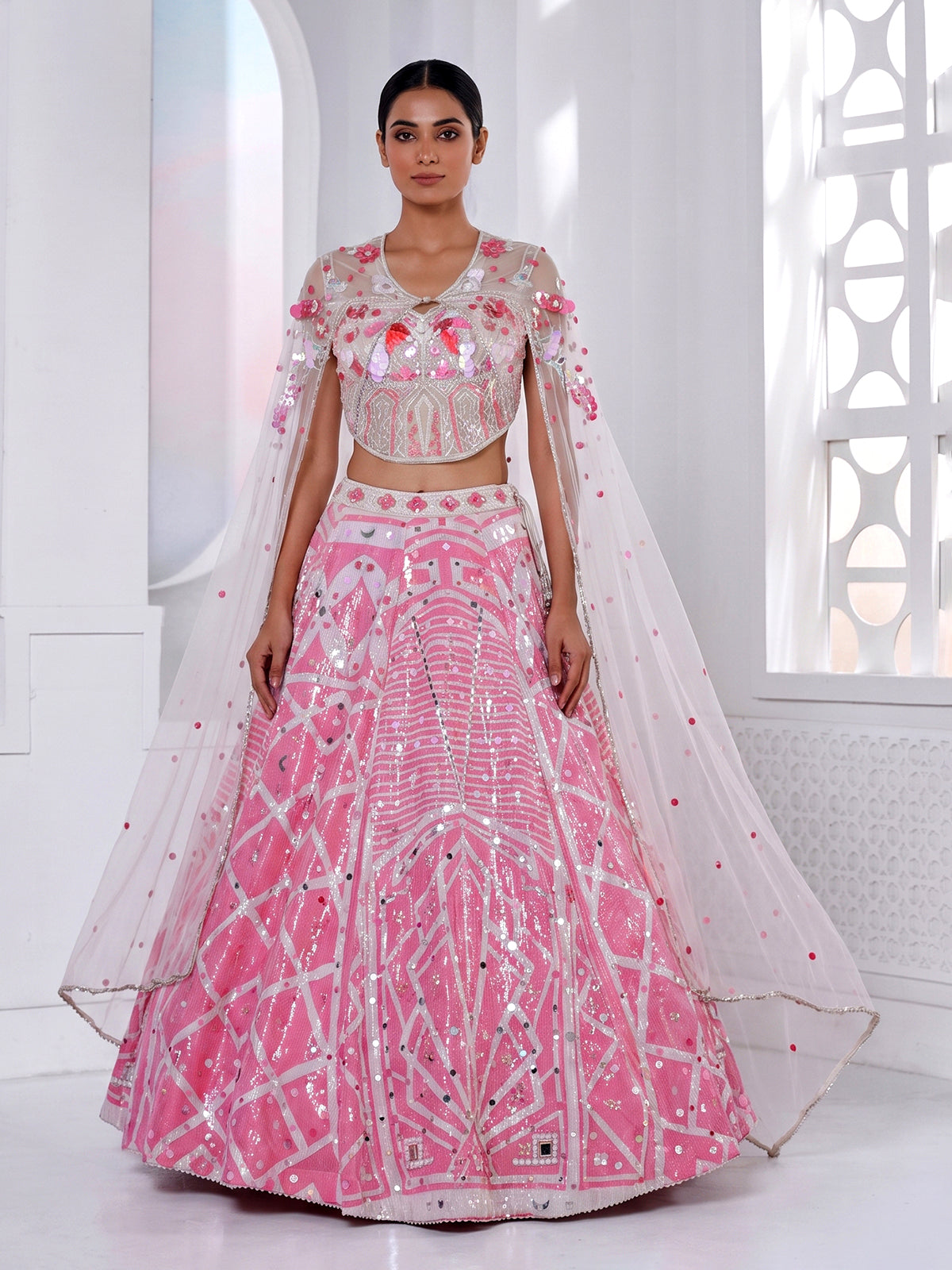 Pink silk cape style designer lehenga ensemble